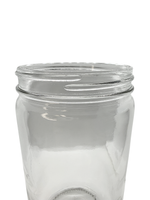 Clear glass jar with a lid on a white background