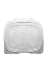 Clear plastic container lid on a white background