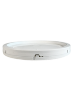 Round white object with a central cutout on a white background