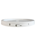 Round white electronic device on a white background