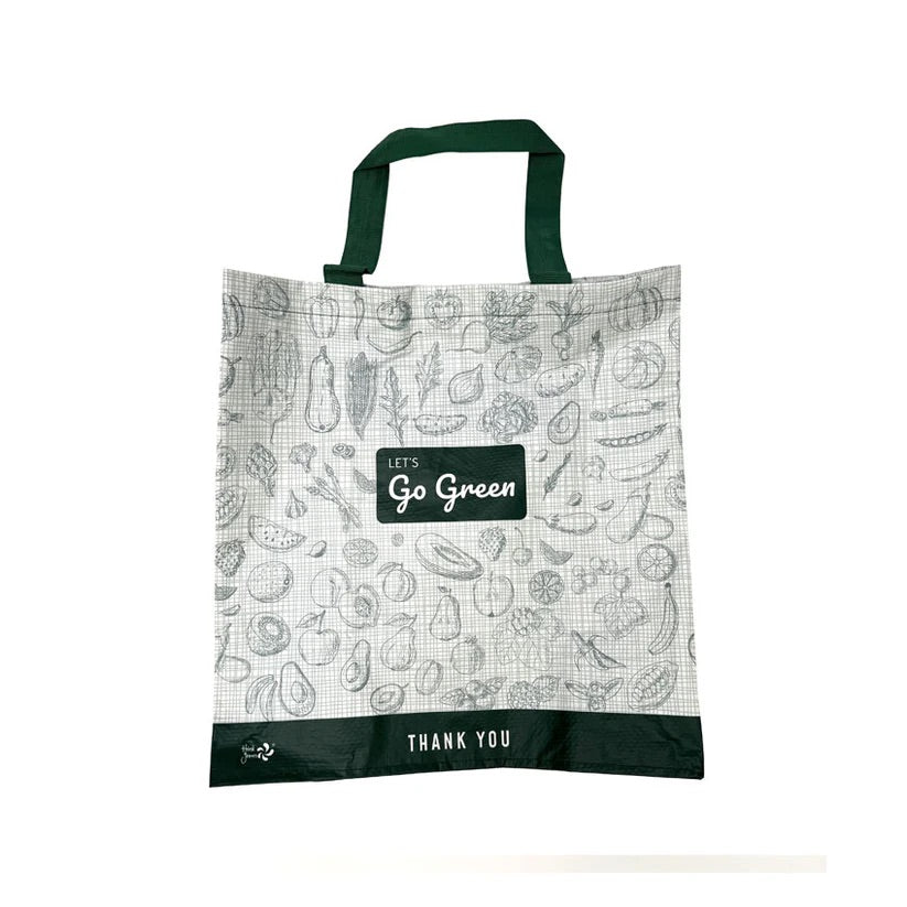 Reusable shopping bag with vegetable pattern and 'Let's Go Green' text on a white background
