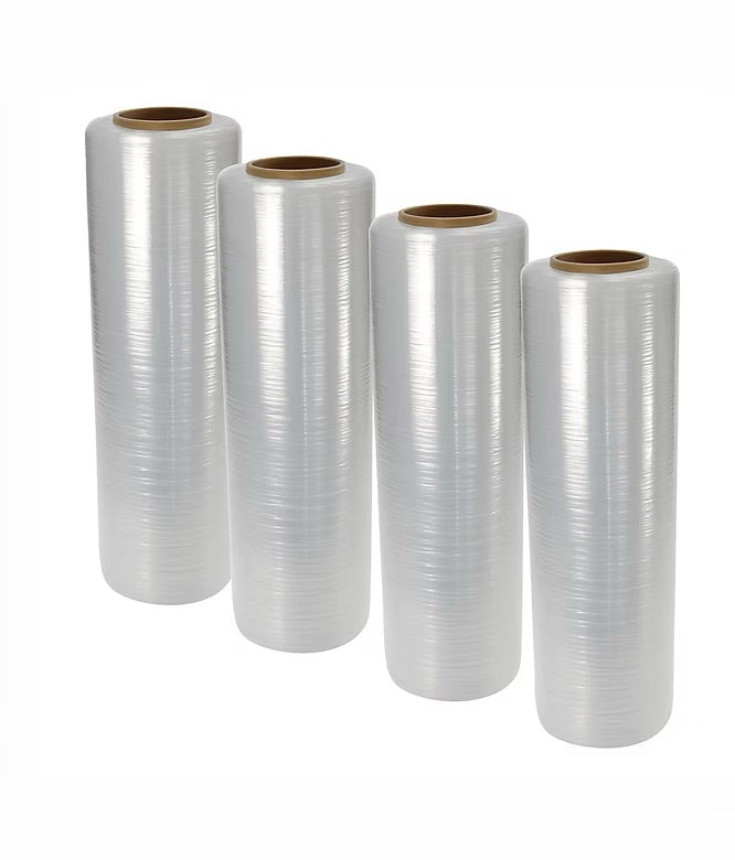 Four rolls of clear plastic wrap on a white background