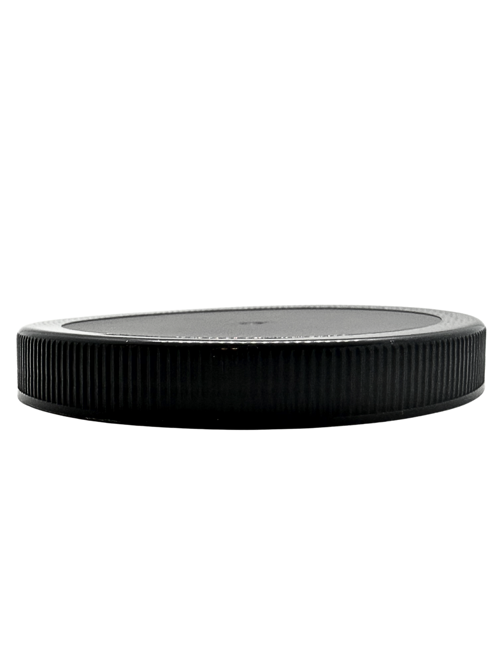 Black plastic lid on a white background