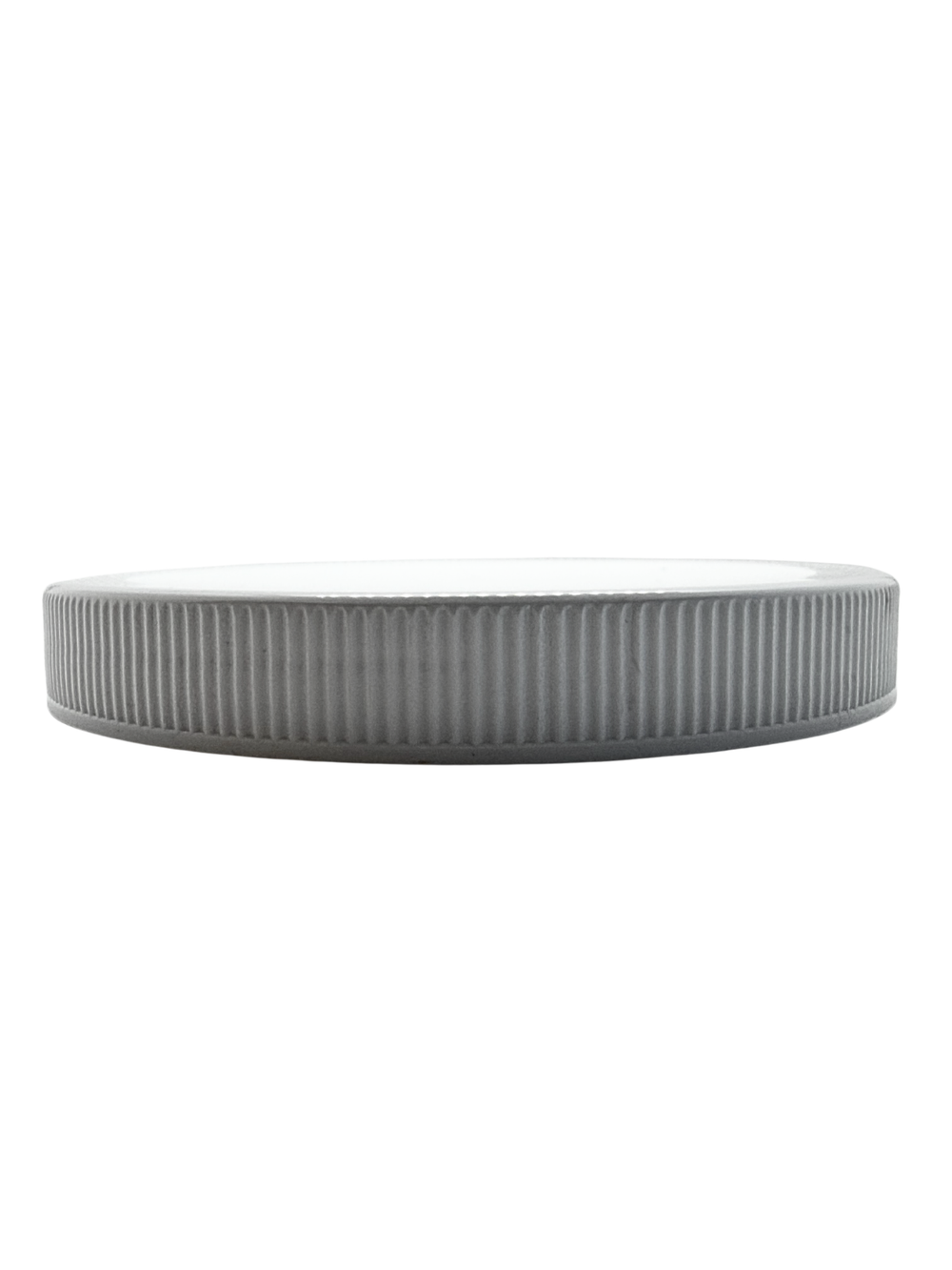 Round gray table with a white top on a white background