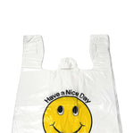 White plastic bag with a yellow smiley face and 'Have a Nice Day' text on a white background