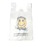 White plastic bag with a smiley face design and text on a white background