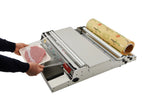 Person using a manual packaging machine with a roll of paper and a container.